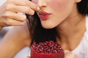 Healthy-Snacks-Girl-Eating-Fruit-1240x820-620x410