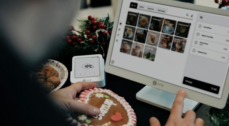 A person sitting at a desk with a computer
